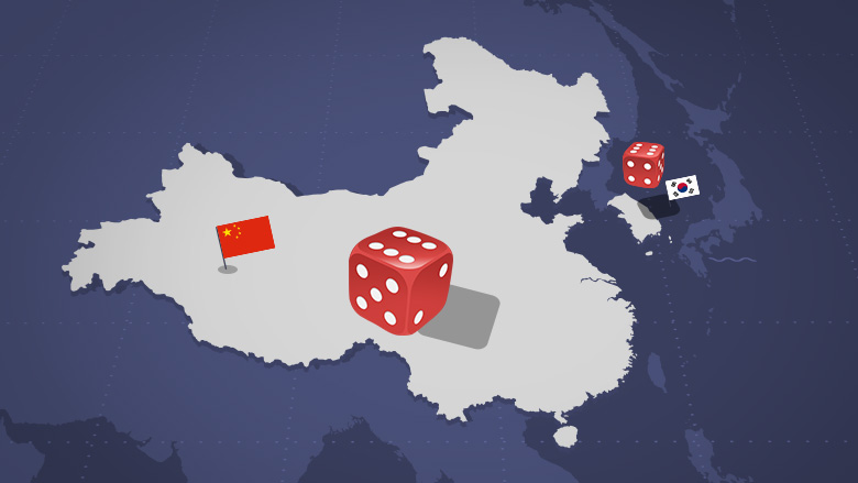 China and South Korea with craps dice bouncing between them